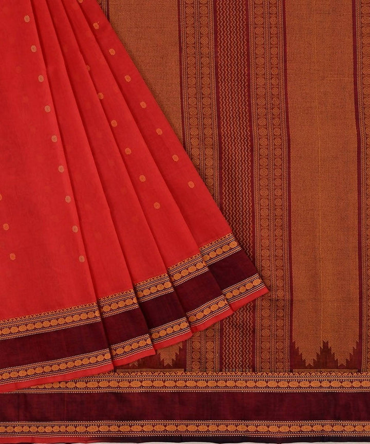Scarlet red kanchi silkcotton saree with butta and maroon border