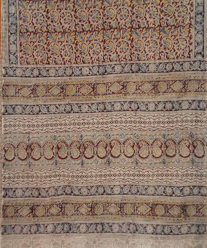 Dark red hand printed cotton kalamkari saree