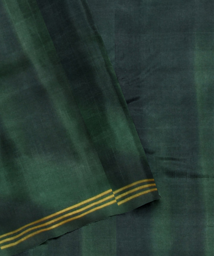 Dark green hand loom patola silk saree
