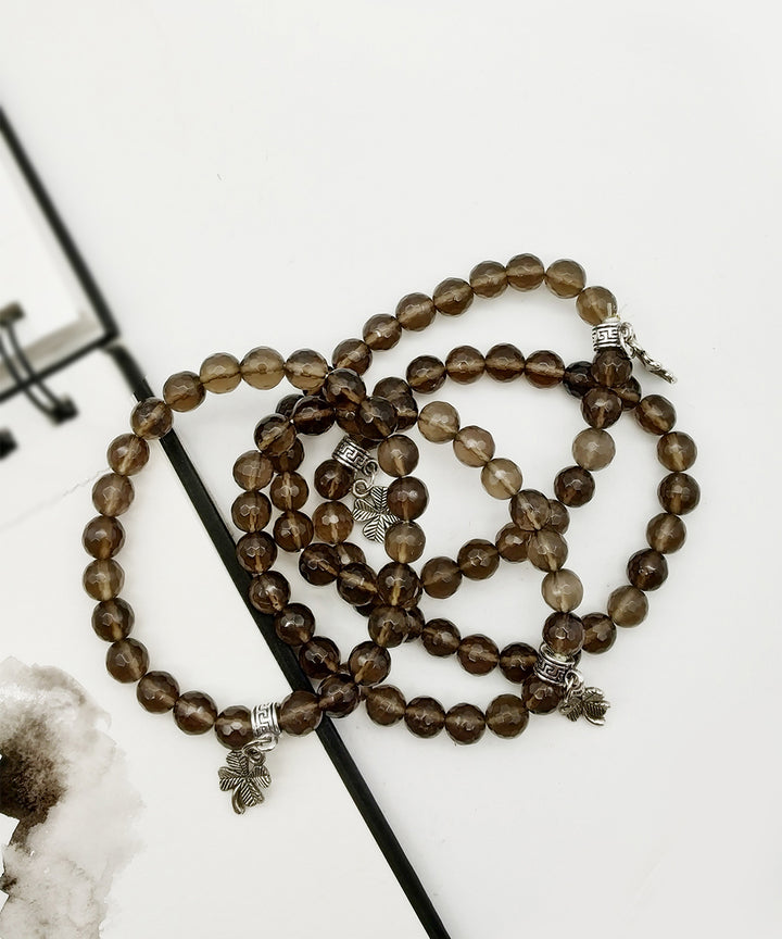 Brown hand crafted quartz peace gemstone bracelet set of 4