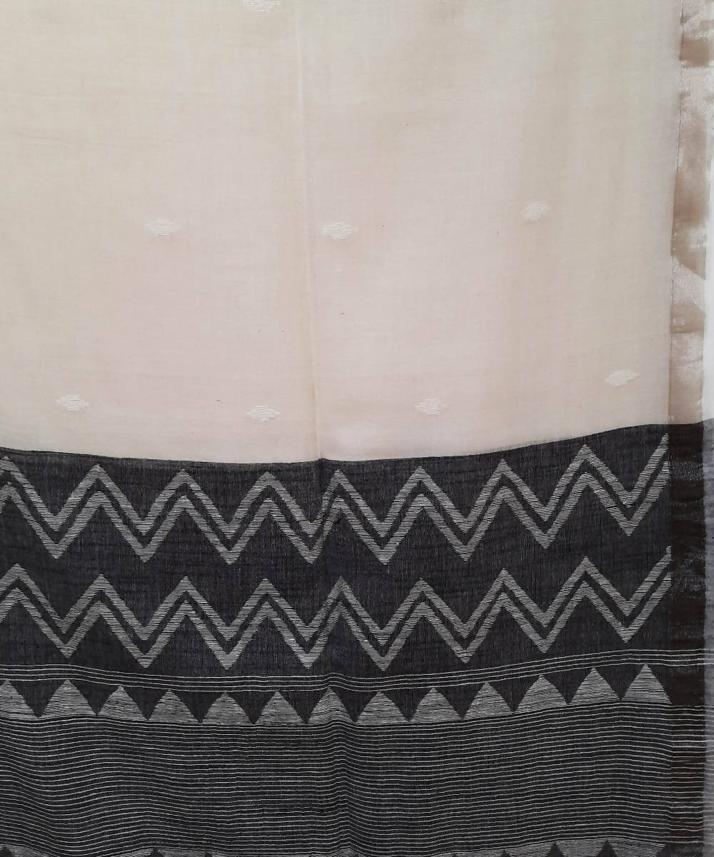 Handwoven off white jamdani muslin saree with silver zari border