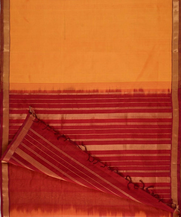 Mustard kanjivaram silk cotton saree with deep red border