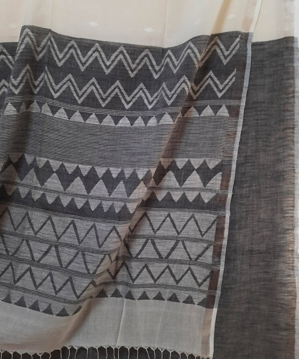 Handwoven off white jamdani muslin saree with silver zari border