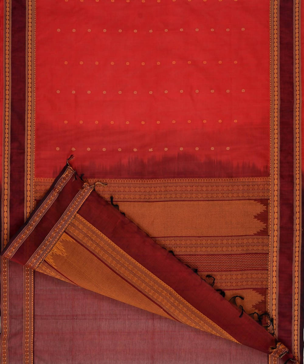 Scarlet red kanchi silkcotton saree with butta and maroon border