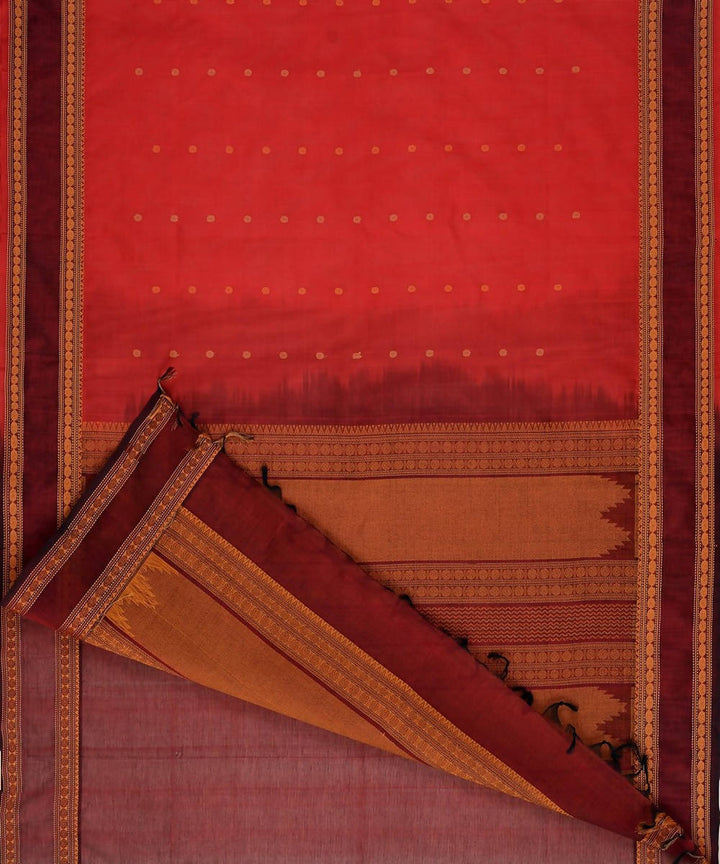 Scarlet red kanchi silkcotton saree with butta and maroon border