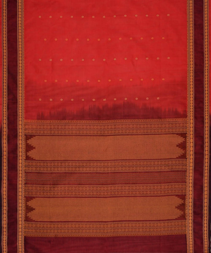 Scarlet red kanchi silkcotton saree with butta and maroon border