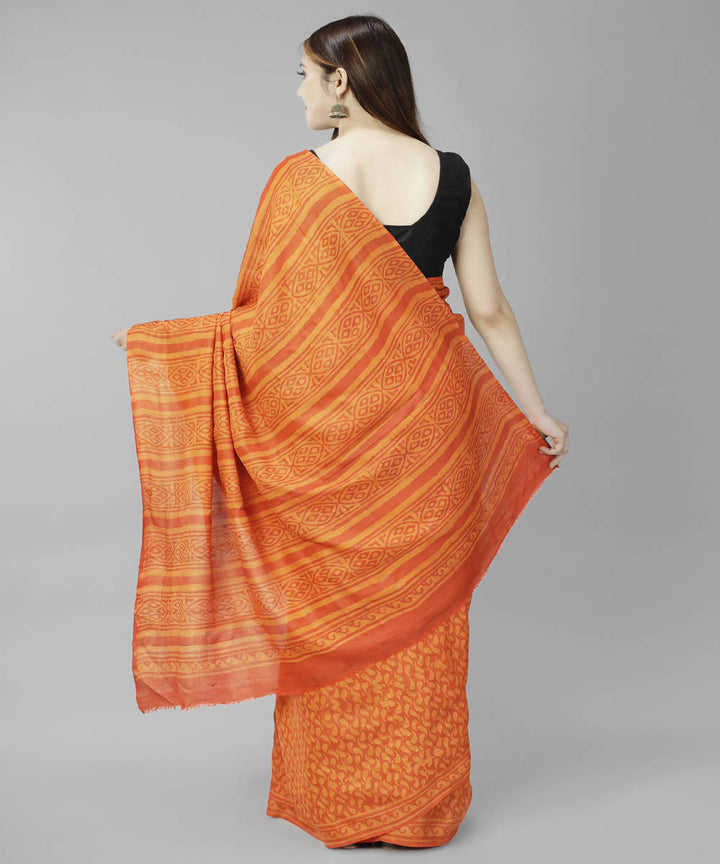 Orange bagru handblock printed tussar silk saree