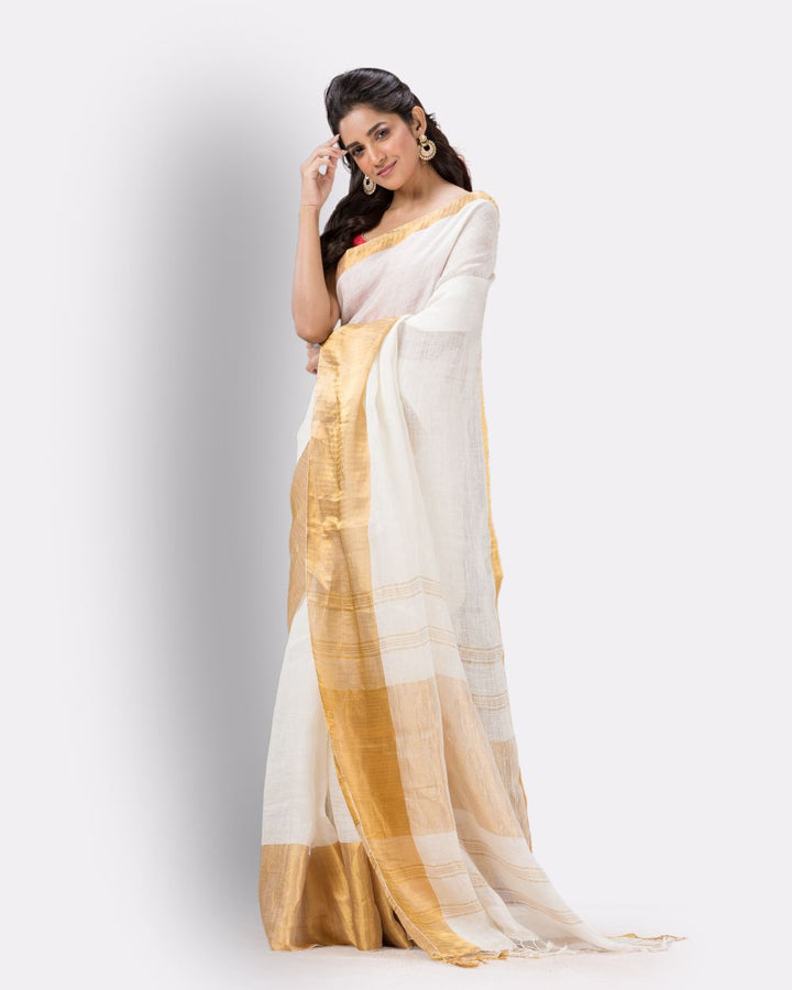 White golden handwoven textured linen bengal saree