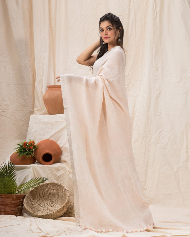 Faded pink handwoven linen bengal saree