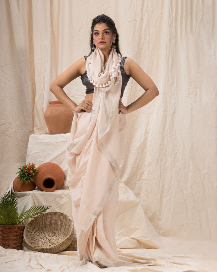 Faded pink handwoven linen bengal saree