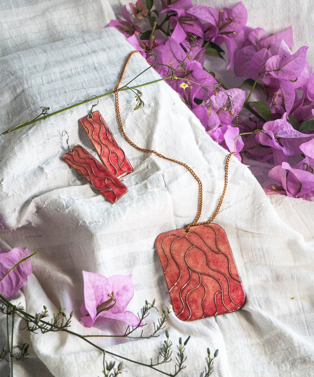 Orange handcrafted copper earring and pendant set