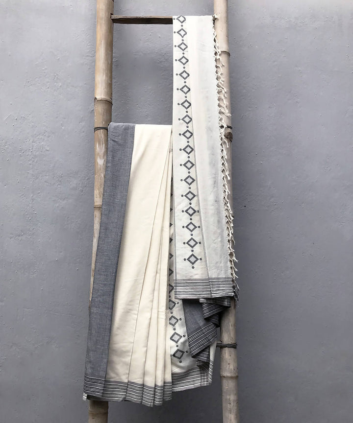 White grey handwoven extra weft cotton saree