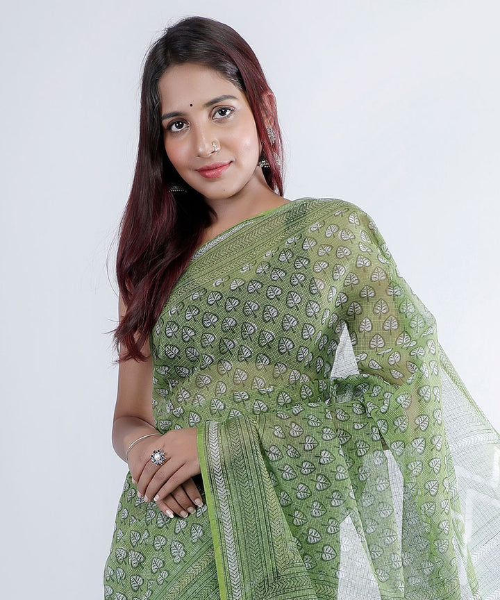 Dark olive green hand printed cotton kota doria saree