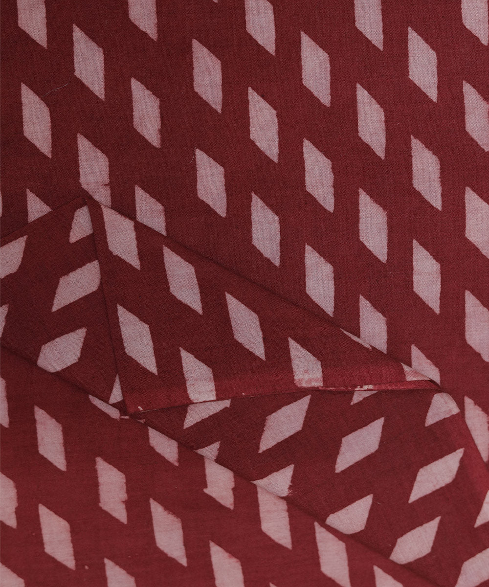 Red and white natural dye diamond motif handblock print fabric