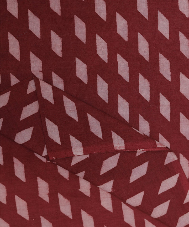 Red and white natural dye diamond motif handblock print fabric