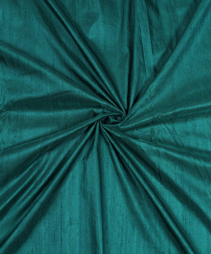 Dual shade dark green handspun handwoven raw silk fabric