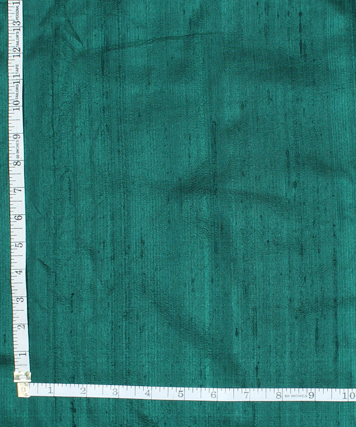 Dual shade dark green handspun handwoven raw silk fabric