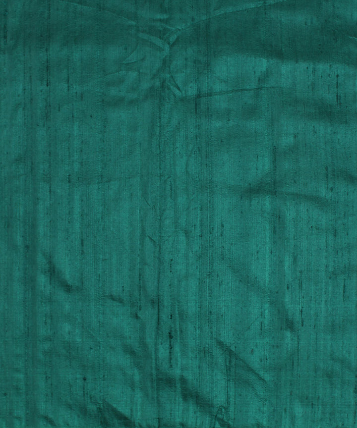 Dual shade dark green handspun handwoven raw silk fabric