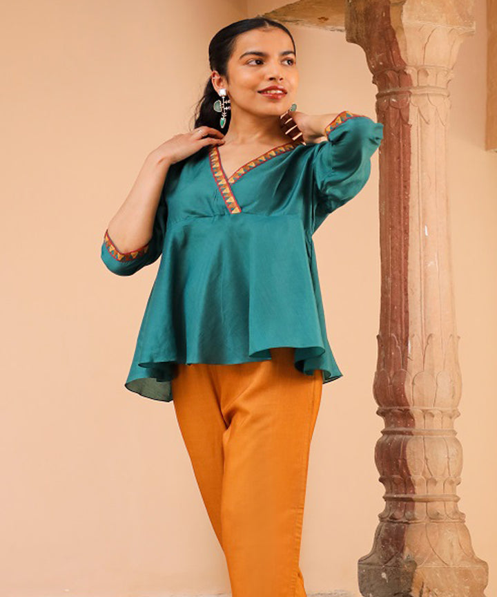 Rangsutra juhi teal green peplum top with crewel embroidery