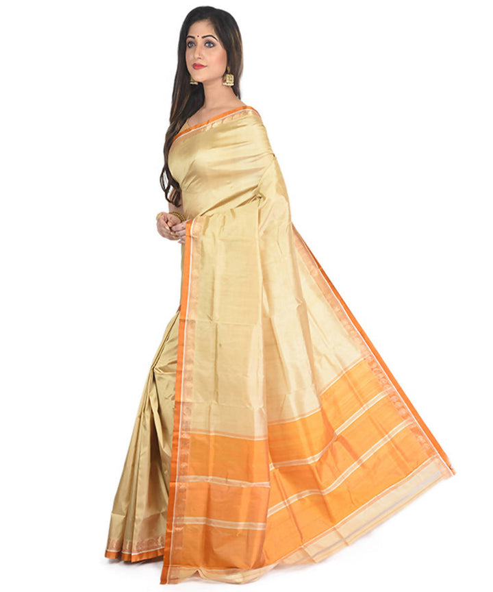 Cream and orange handloom garad silk saree