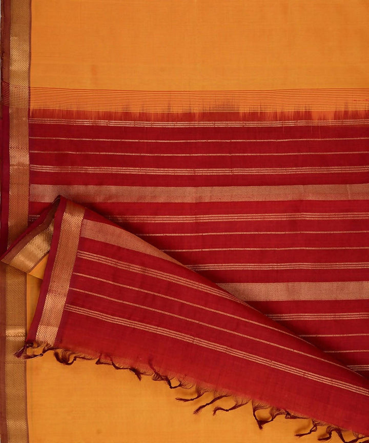 Mustard kanjivaram silk cotton saree with deep red border