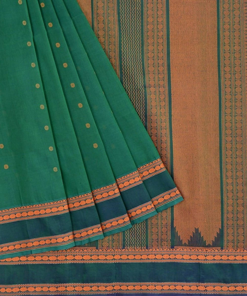 Pista Green Kanchi Silk Saree Highlighted by Thread Buttas All Over Its Body, Complemented by a Contrast Temple Border, Grandly Woven Pallu of Intricate Design Weave, and Paired with a Contrast Blouse