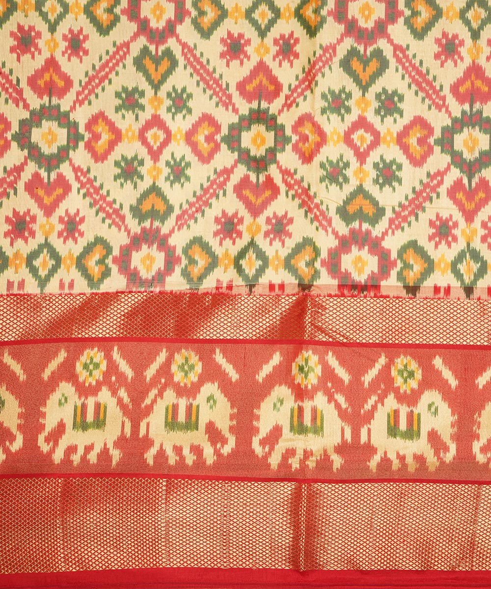 Cream orange silk handloom pochampally ikat saree