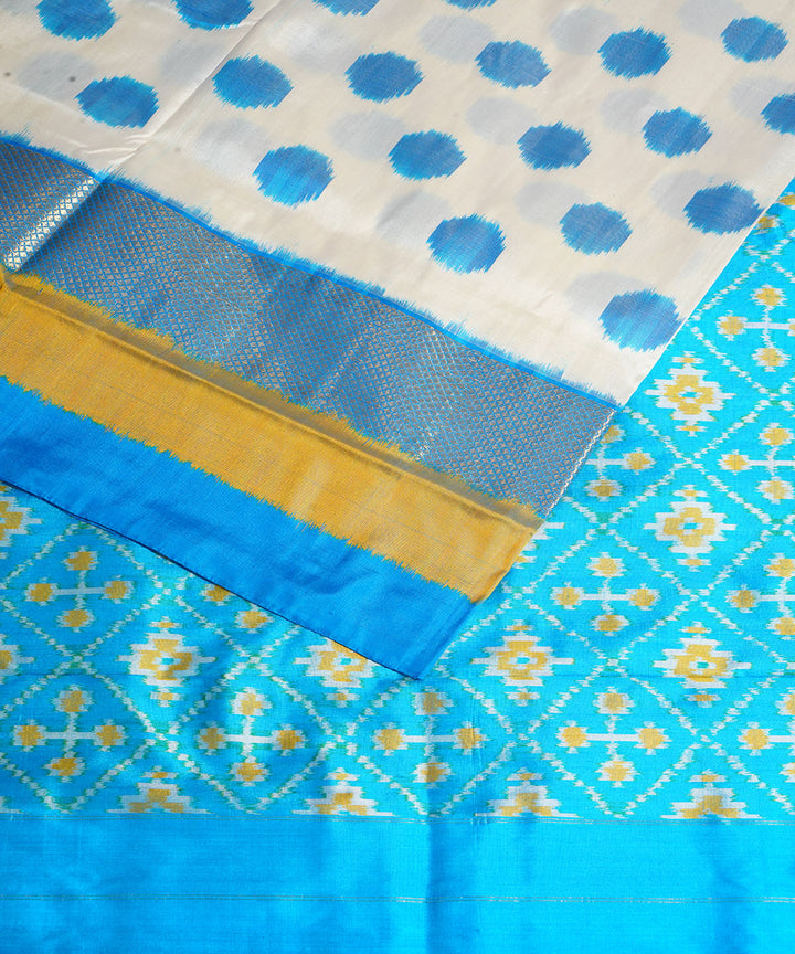 Offwhite blue handwoven pochampally ikat silk saree