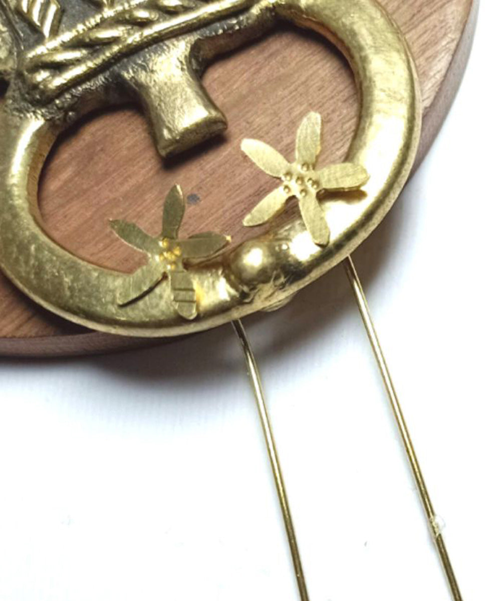 Golden handcrafted dhokra brass earring