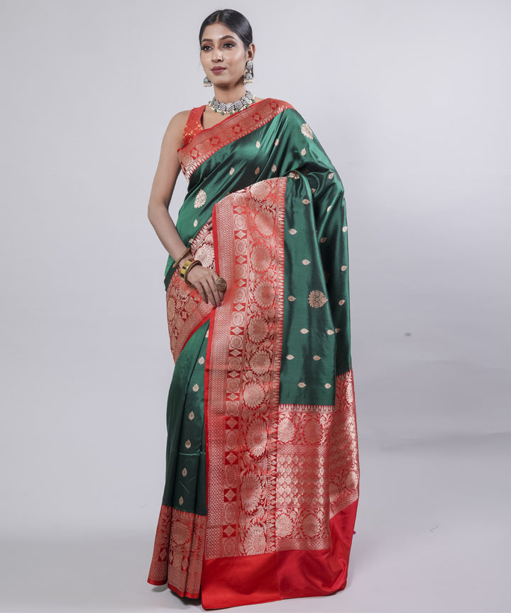 Dark green red border silk handwoven banarasi saree