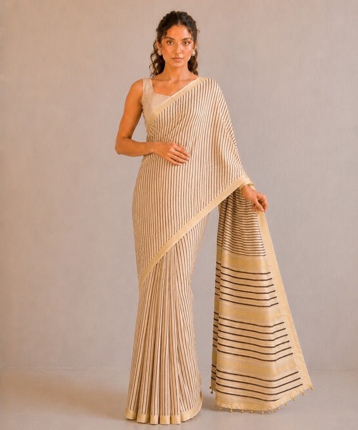 Brown golden hand embroidered chanderi silk saree