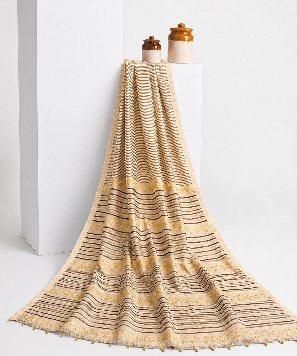 Brown golden hand embroidered chanderi silk saree