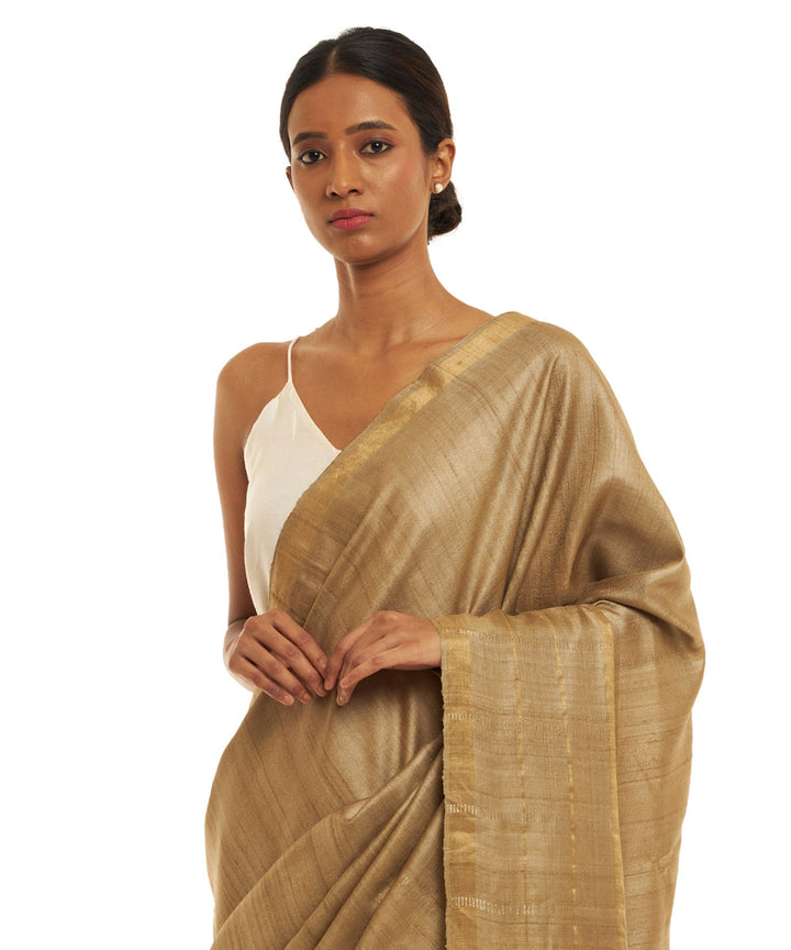 Handwoven khaki kosa saree with gold silver zari