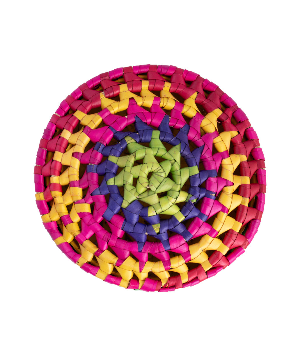 Handwoven colorful round palm leaf basket