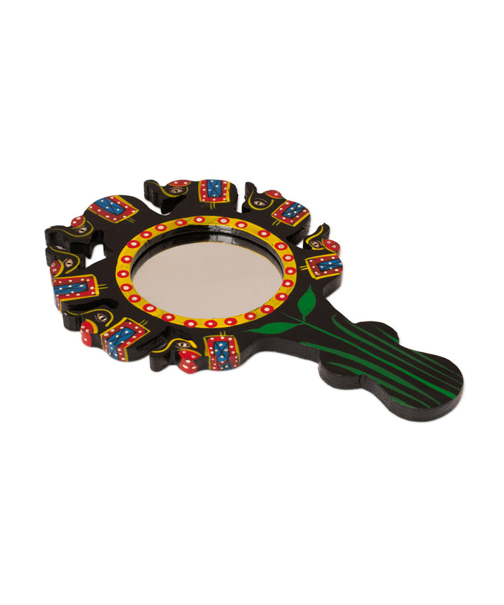 Hand held face mirror