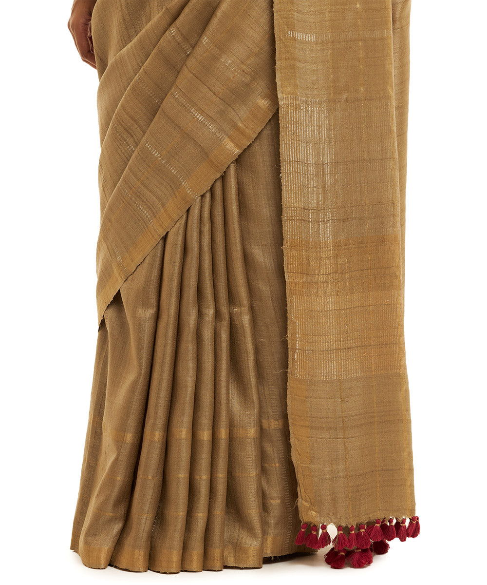 Handwoven khaki kosa saree with gold silver zari