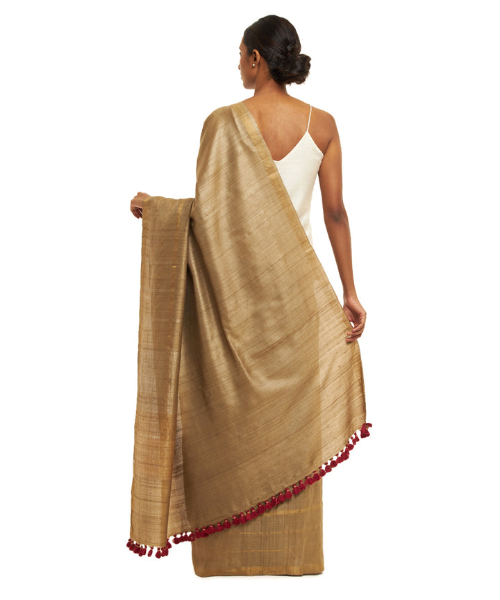 Handwoven khaki kosa saree with gold silver zari