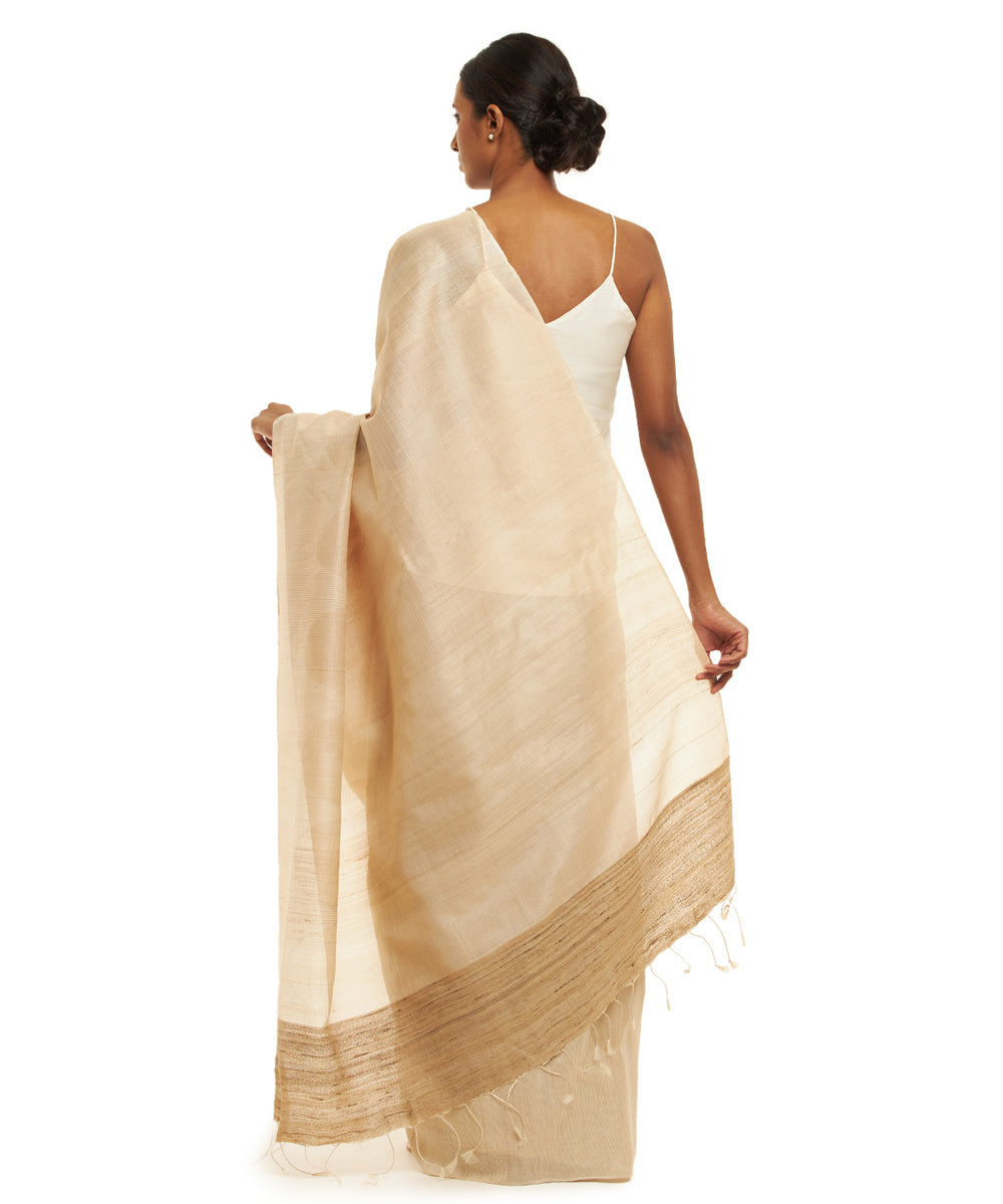 Handwoven beige kosa silk saree white temple border