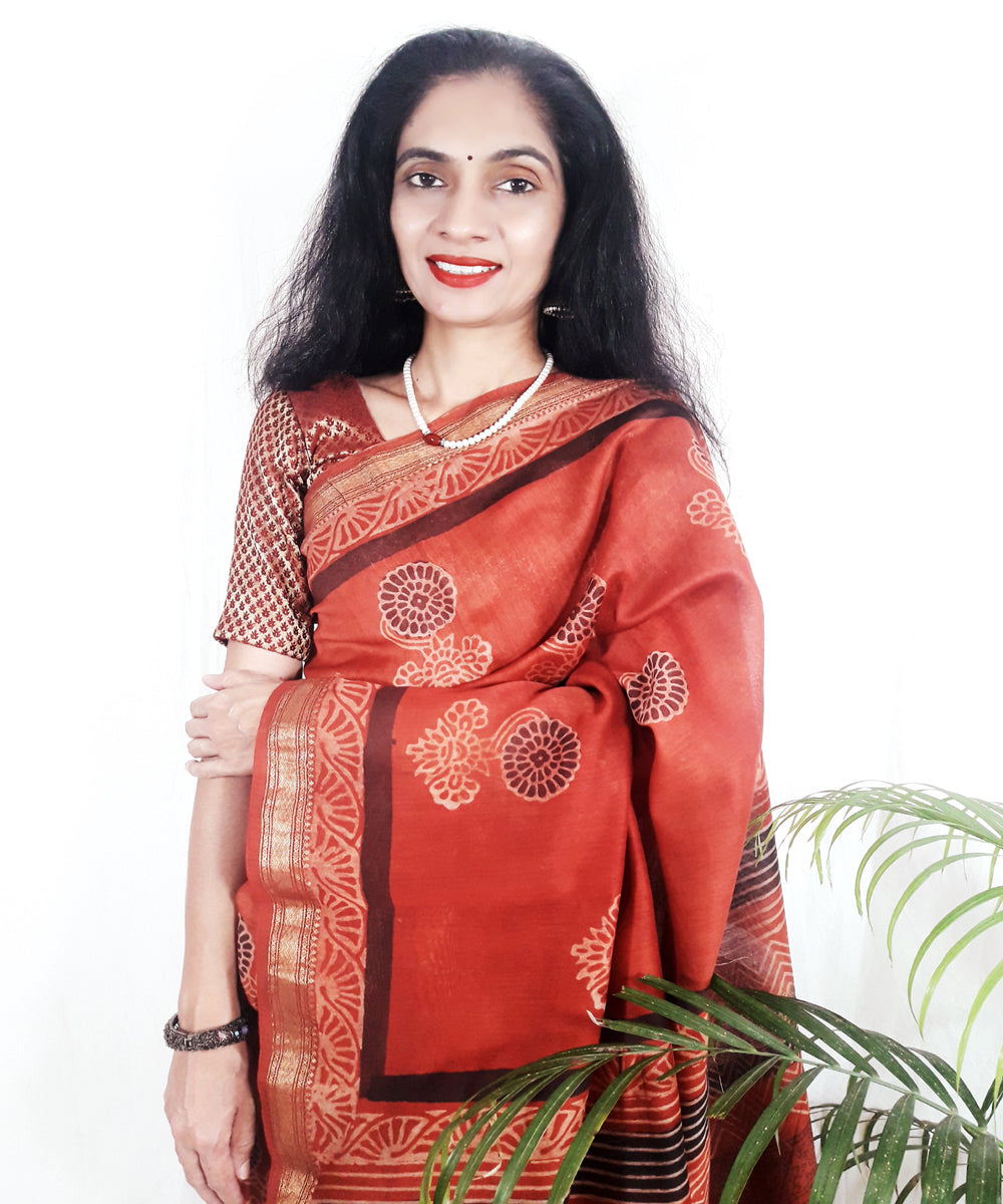 Orange hand printed silk ajrakh saree