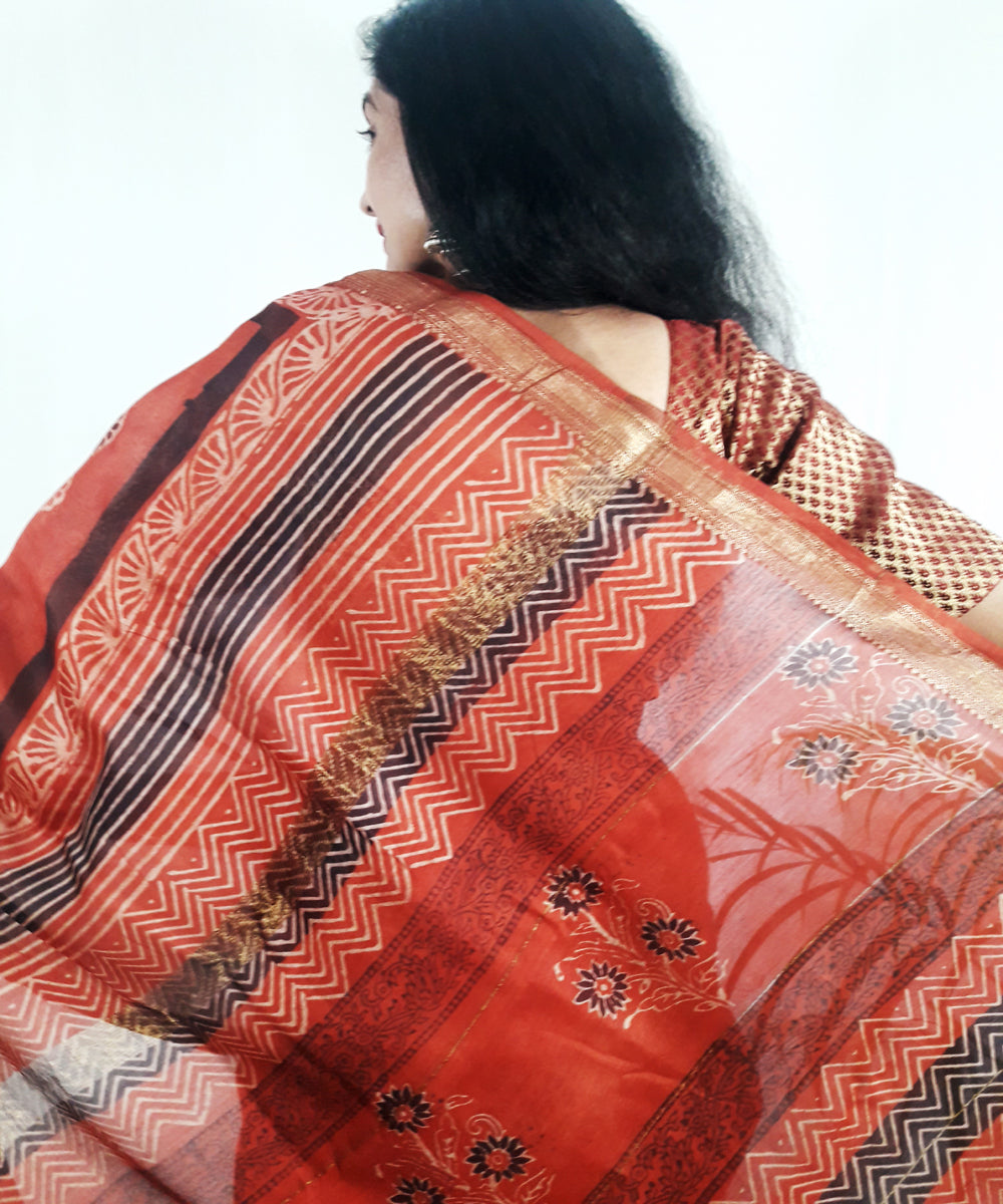 Orange hand printed silk ajrakh saree