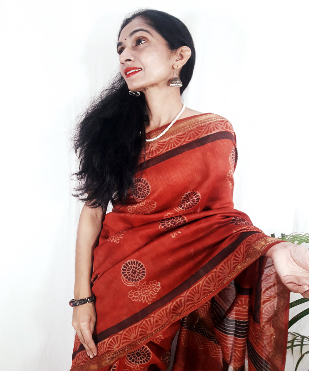 Orange hand printed silk ajrakh saree