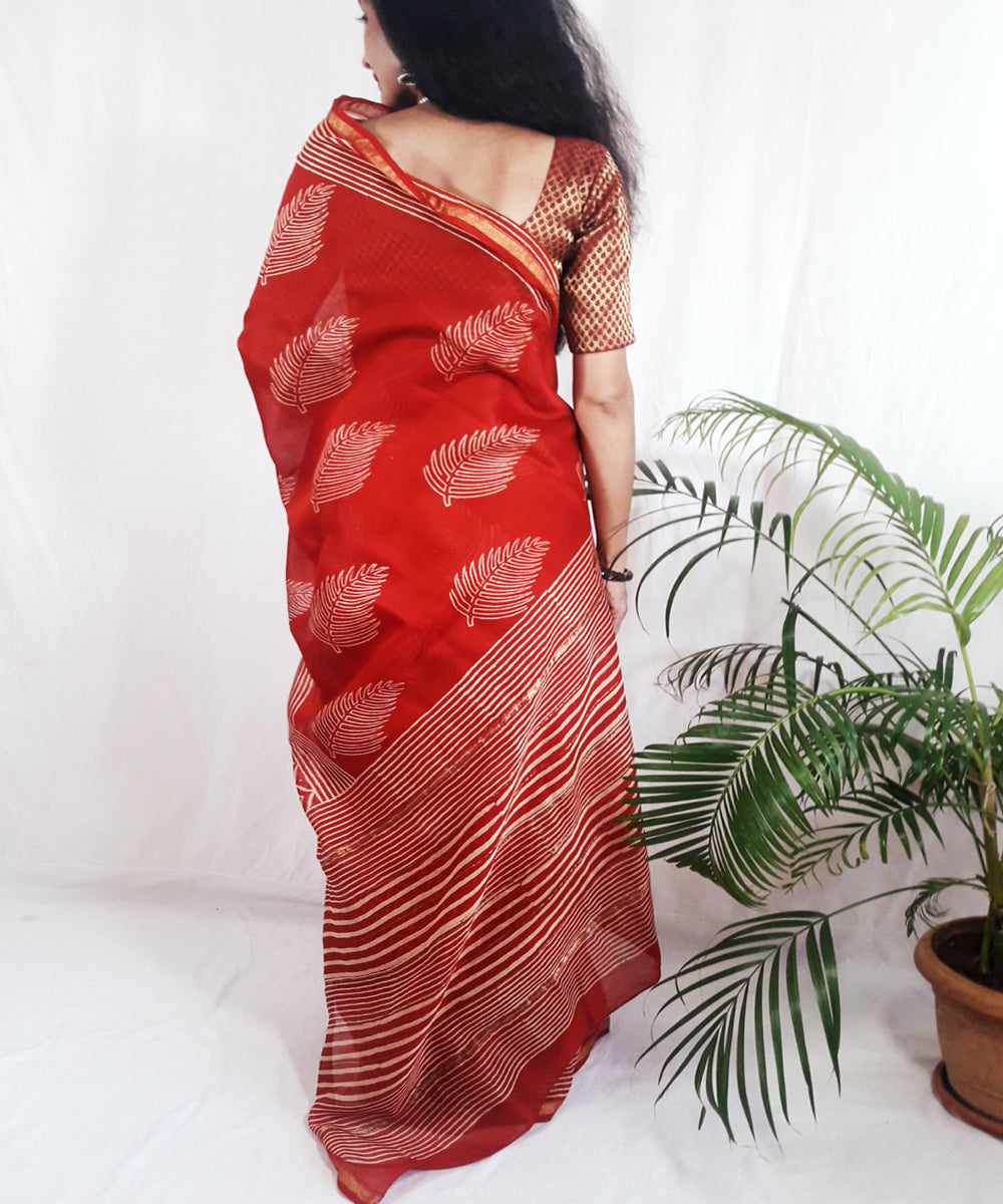 Bright orange hand printed silk ajrakh saree