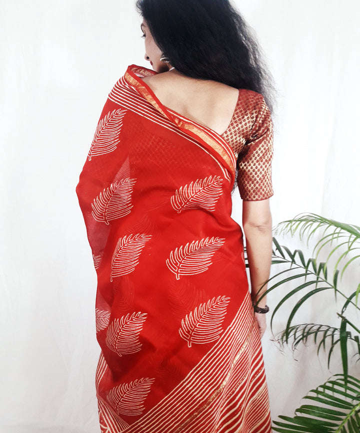 Bright orange hand printed silk ajrakh saree