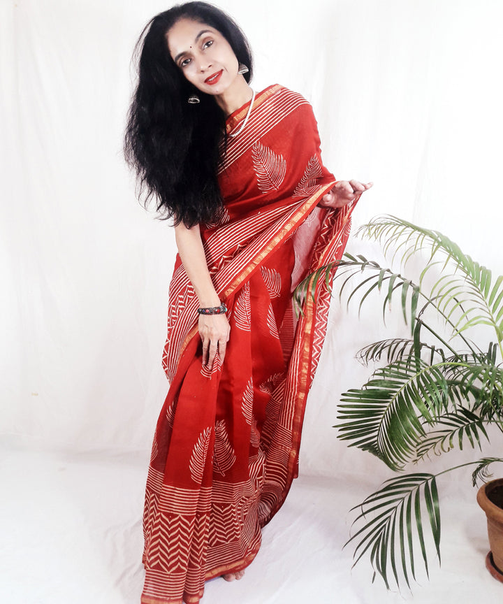 Bright orange hand printed silk ajrakh saree