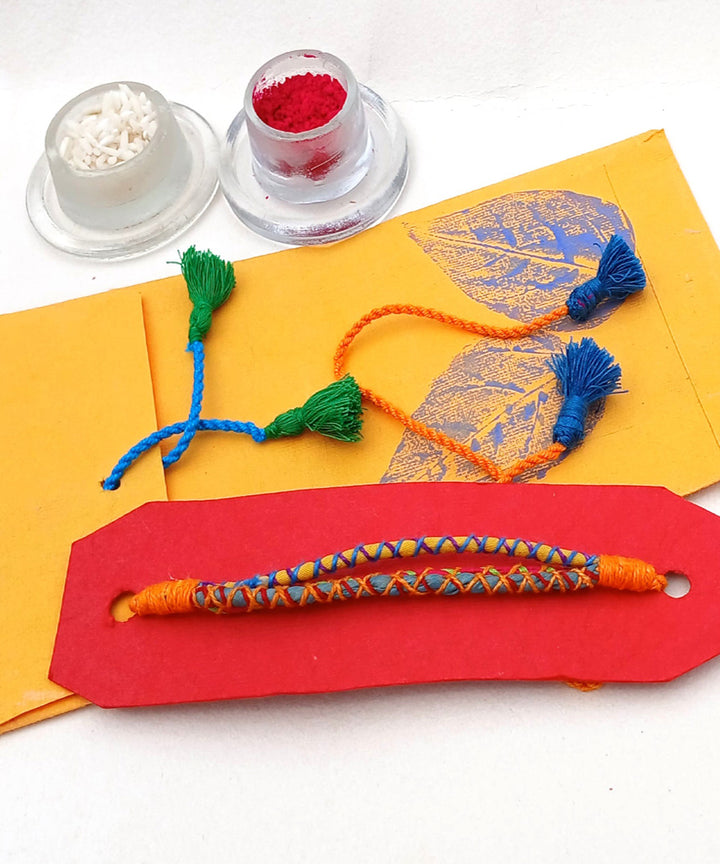 Handmade orange cotton silk threads adjustable rakhi