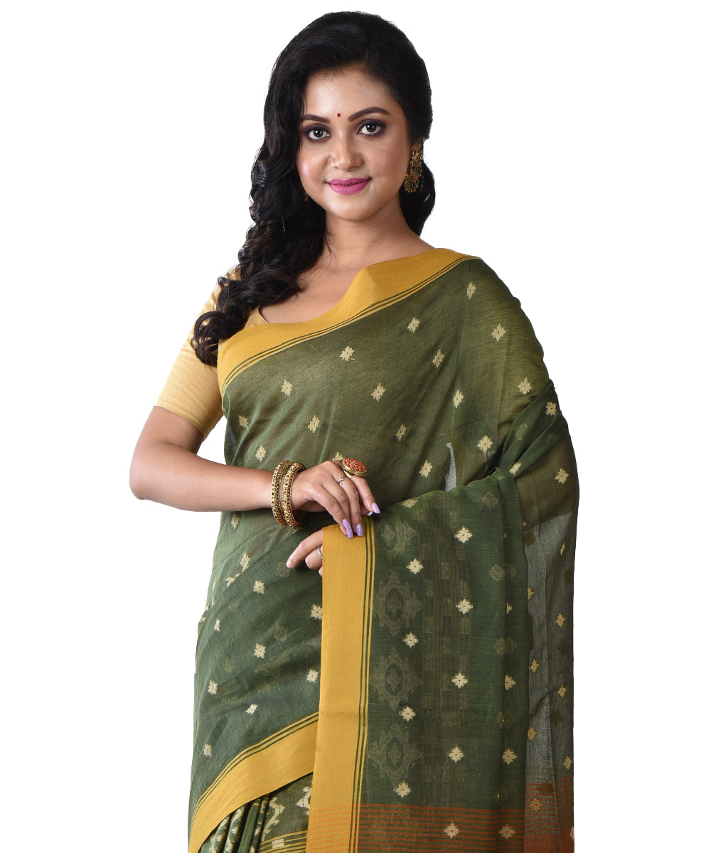 Dark green shantipuri handloom cotton saree