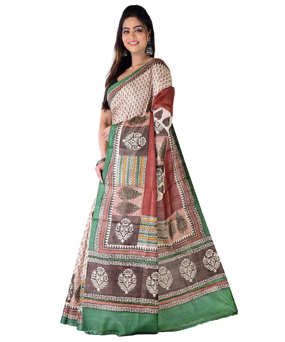 Beige multicolor hand printed tussar silk saree