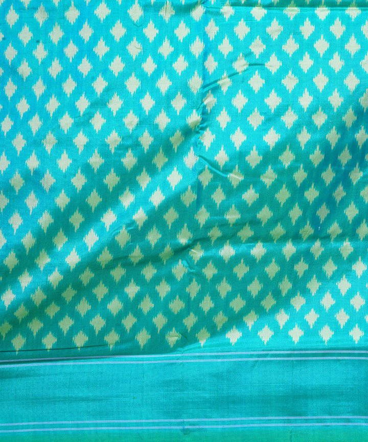 Light green cyan blue handwoven pochampally ikat silk saree