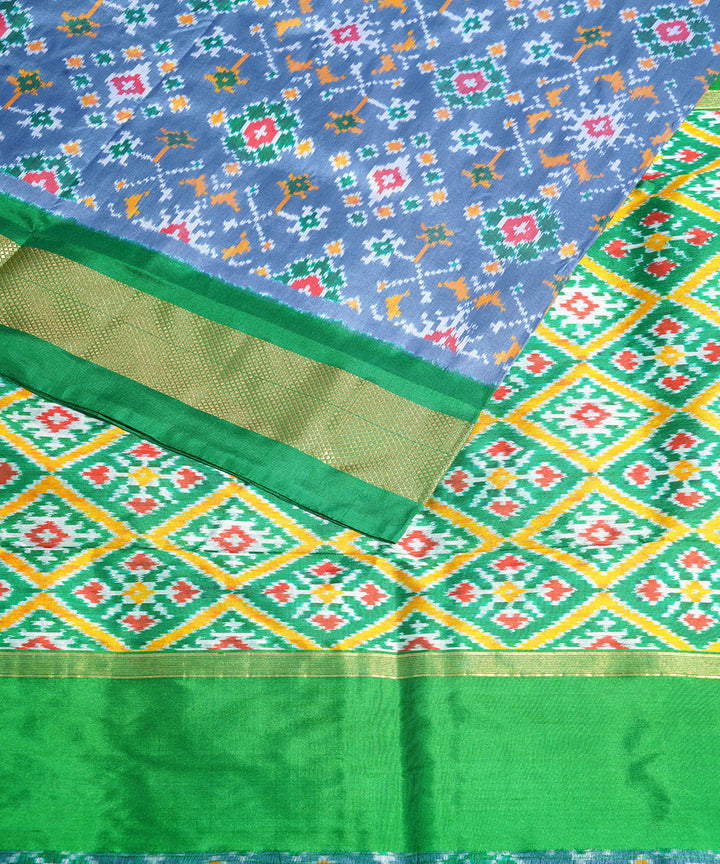 Grey green handwoven pochampally ikat silk saree