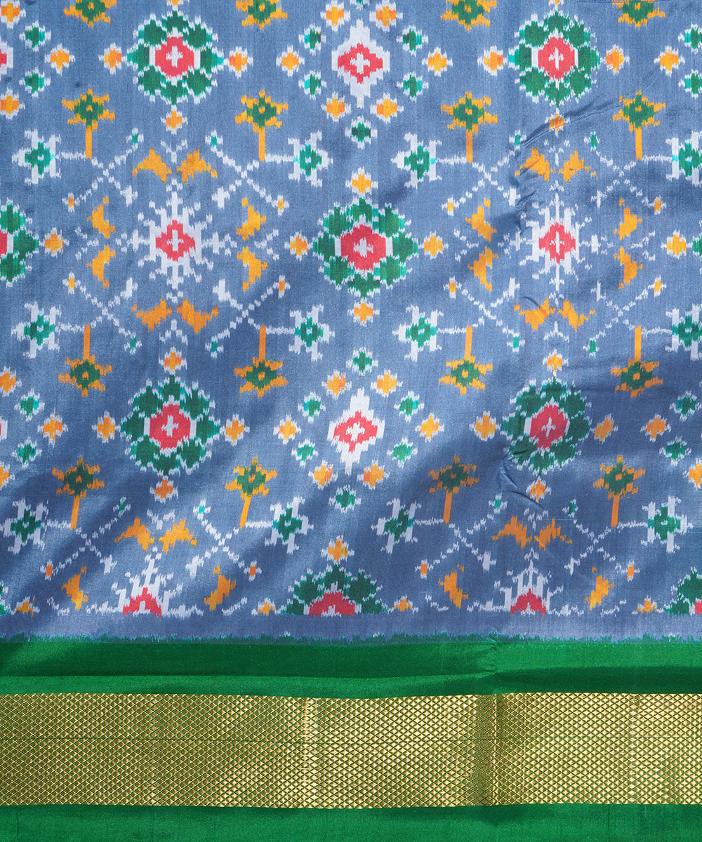 Grey green handwoven pochampally ikat silk saree